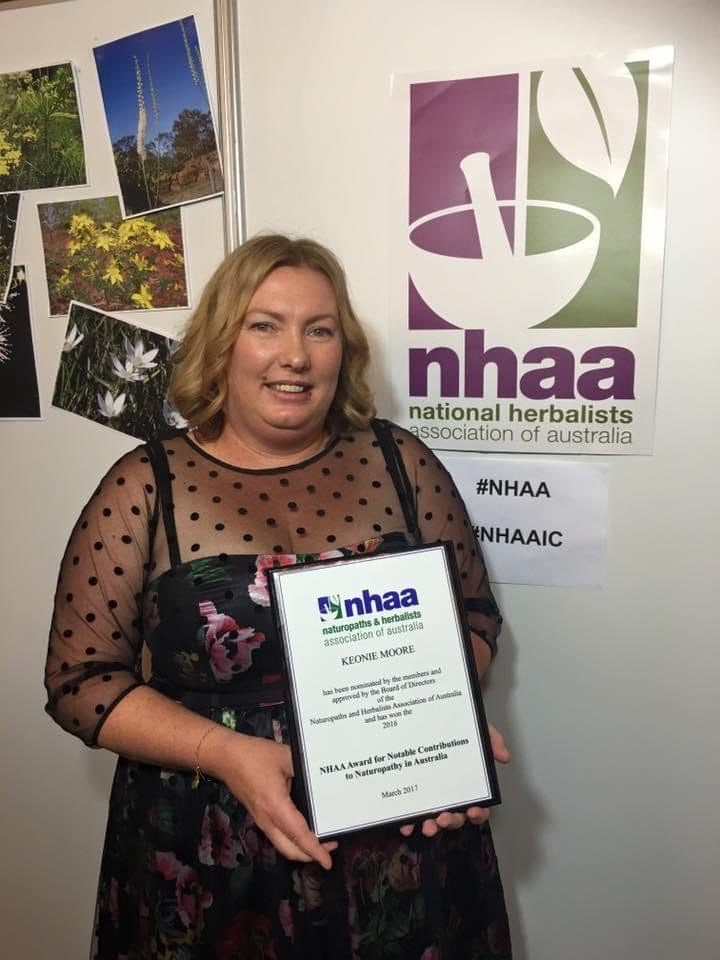 Keonie Moore with her NHAA award